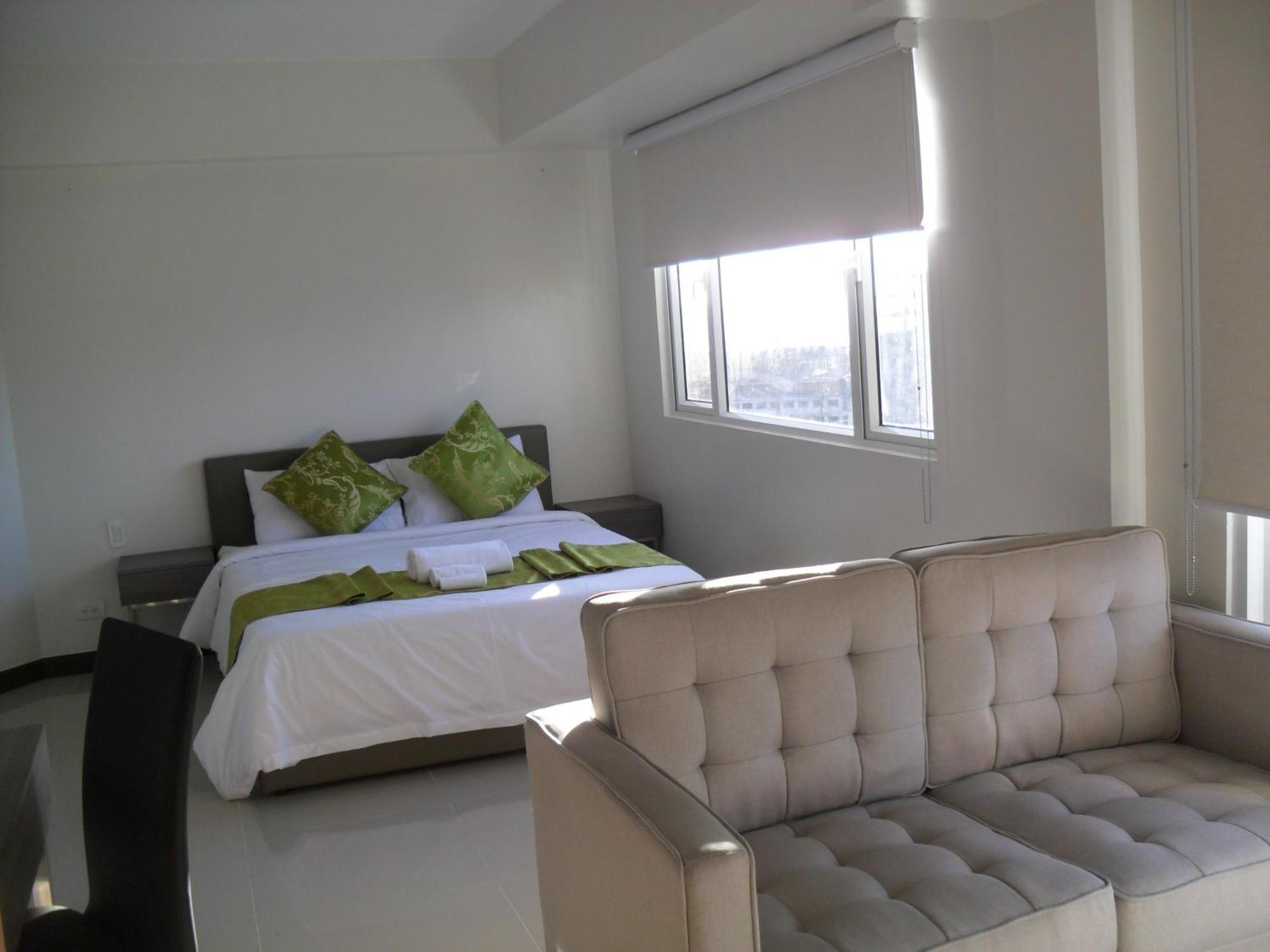 Extremeli Suites Manila Powered By Cocotel Rum bild