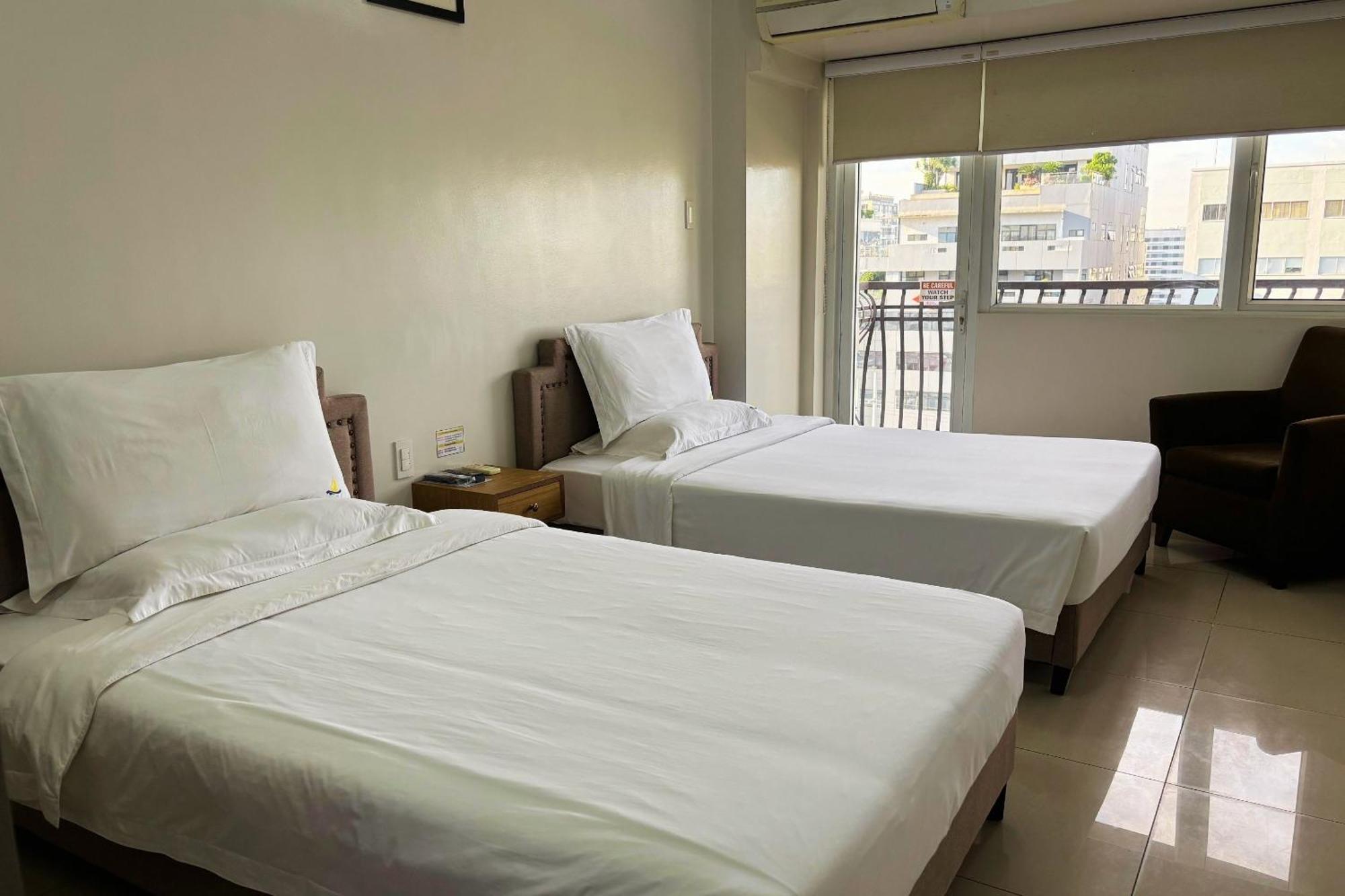 Extremeli Suites Manila Powered By Cocotel Exteriör bild