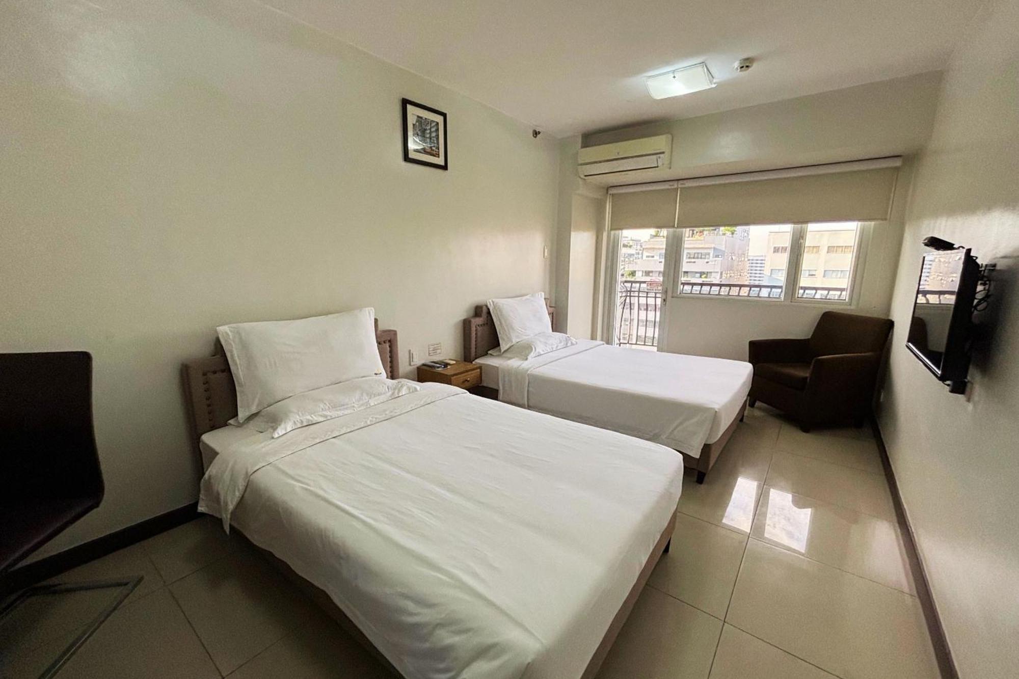 Extremeli Suites Manila Powered By Cocotel Exteriör bild