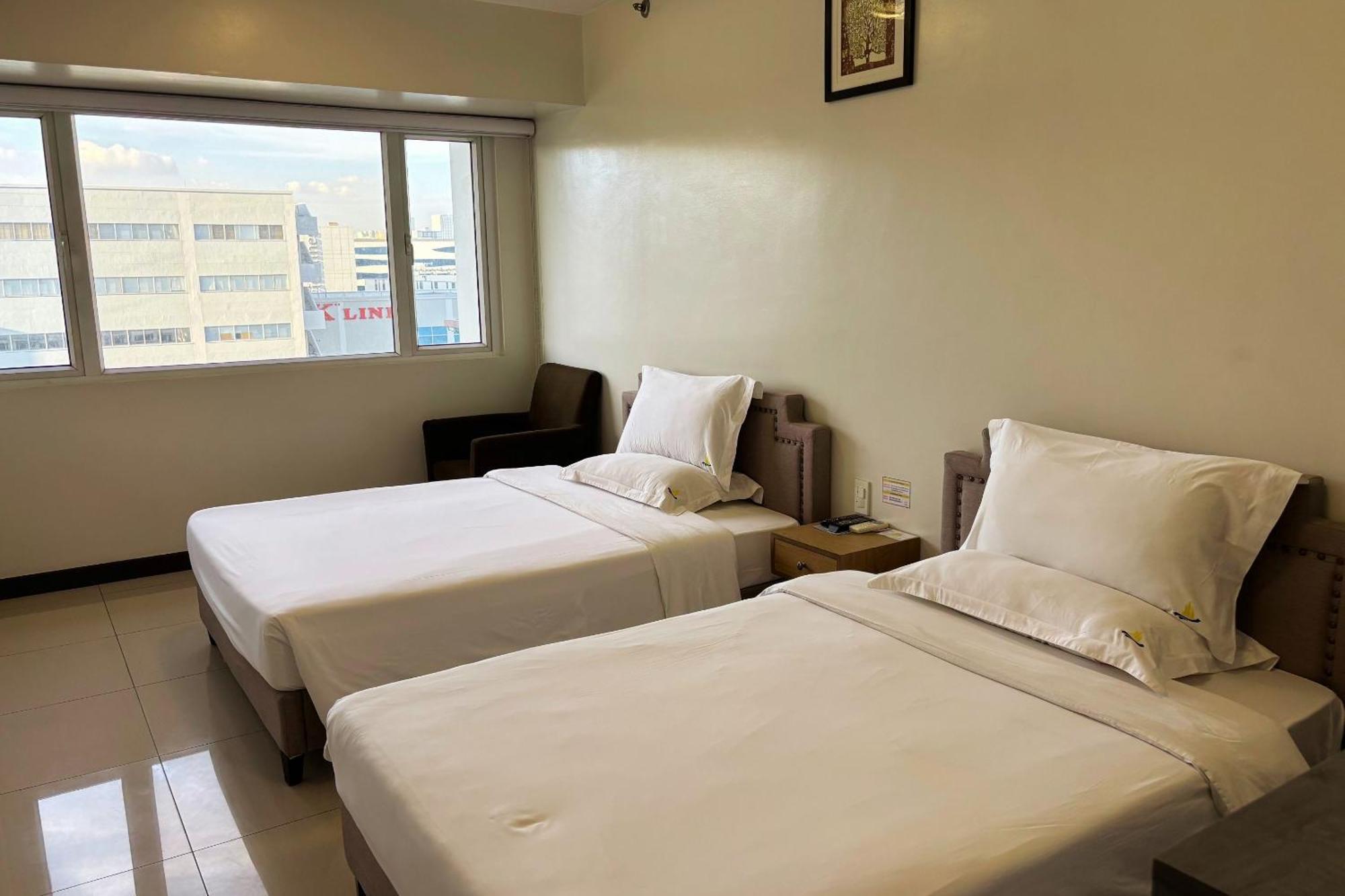 Extremeli Suites Manila Powered By Cocotel Exteriör bild