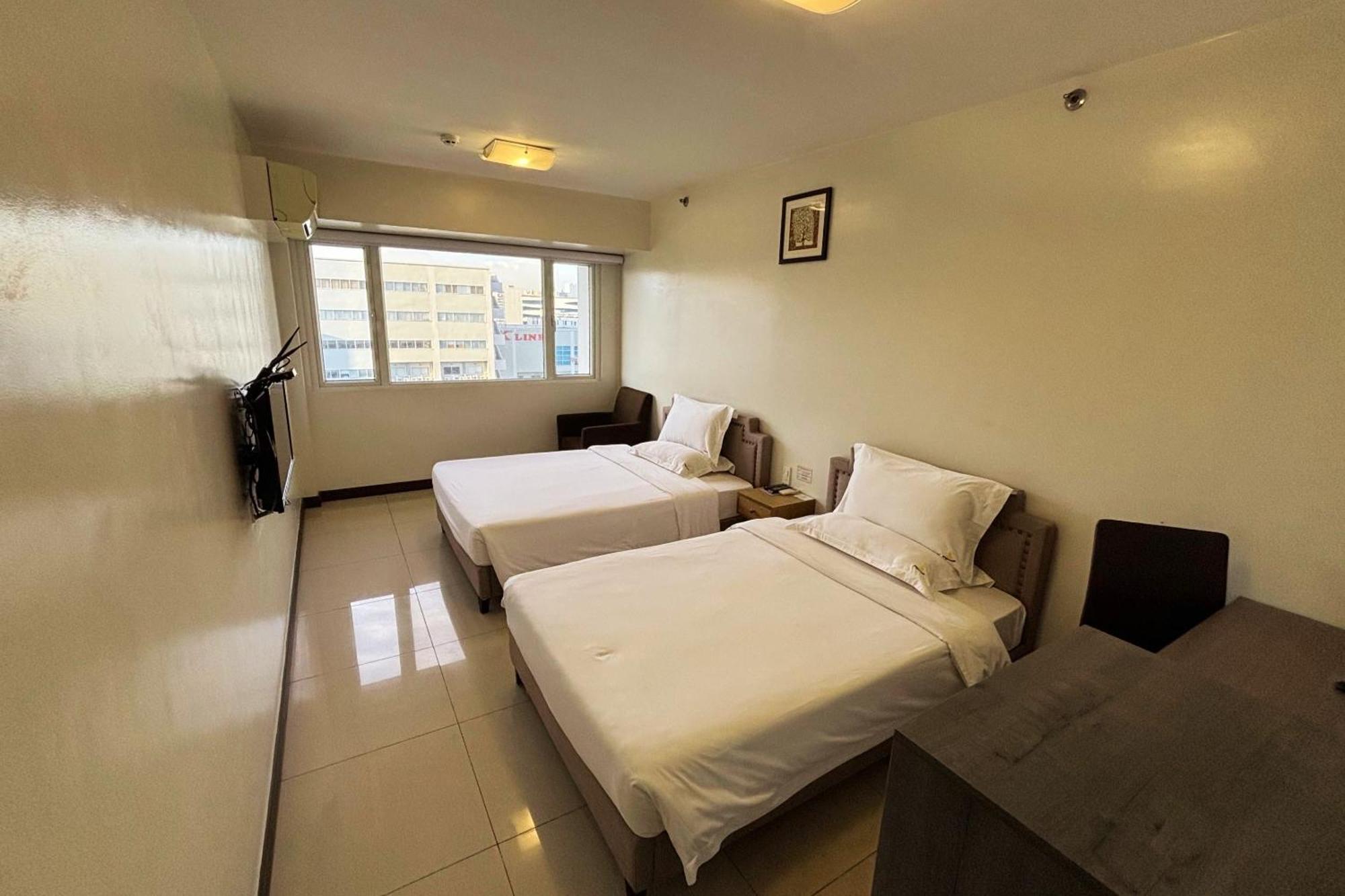 Extremeli Suites Manila Powered By Cocotel Exteriör bild