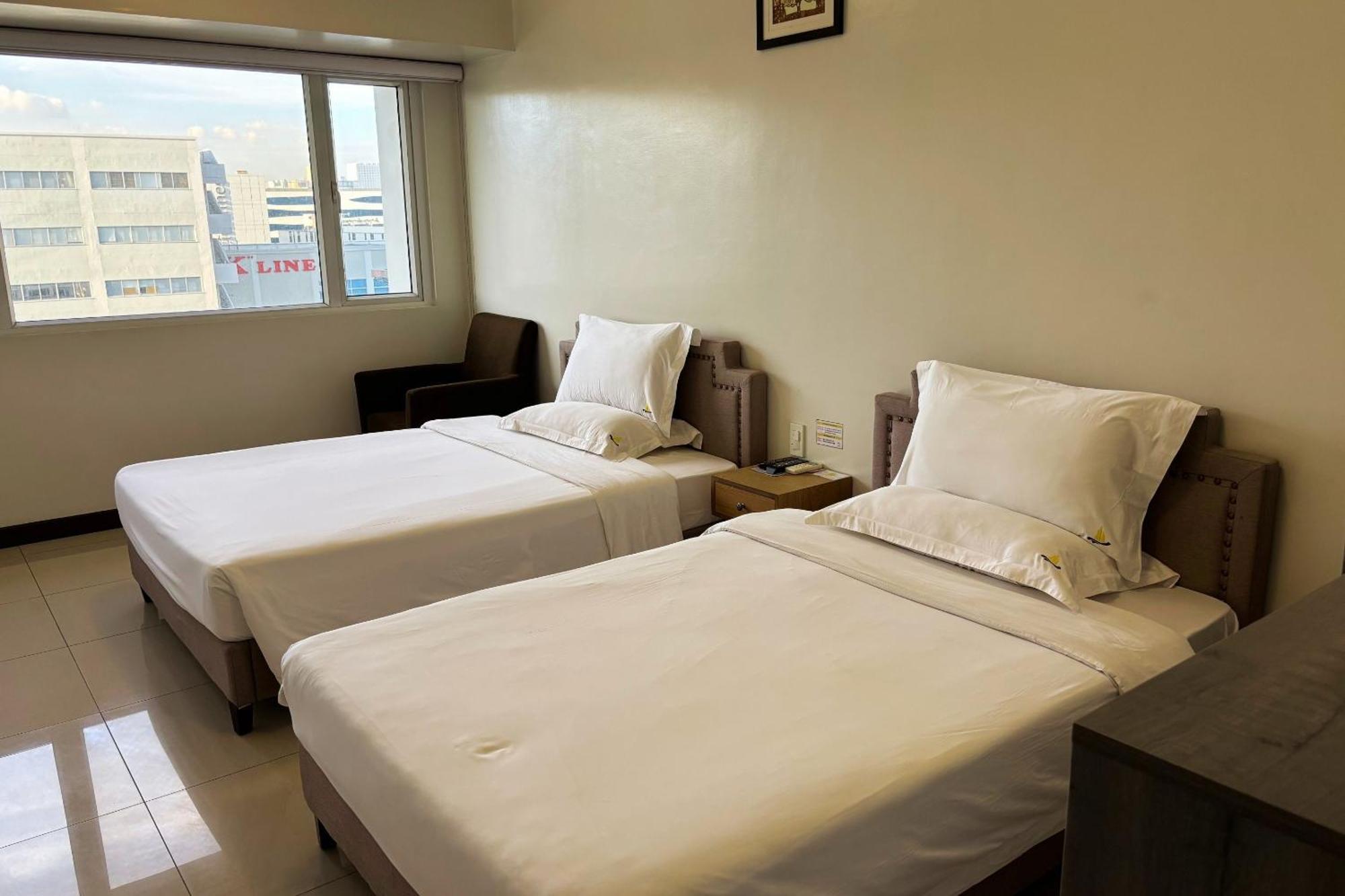 Extremeli Suites Manila Powered By Cocotel Exteriör bild